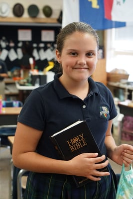 6th-grade-girl-with-bible-in-class