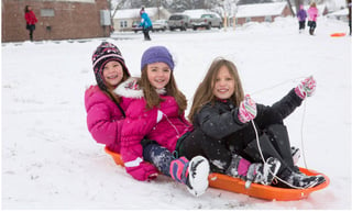 Veritas kids enjoy sledding at recess