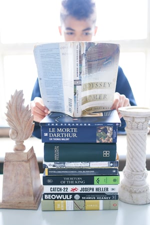 boy reading books