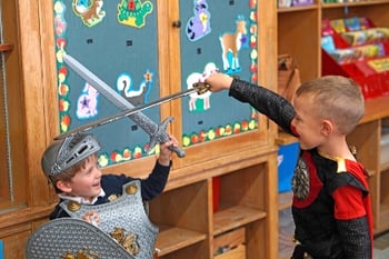 boys sword fighting knights