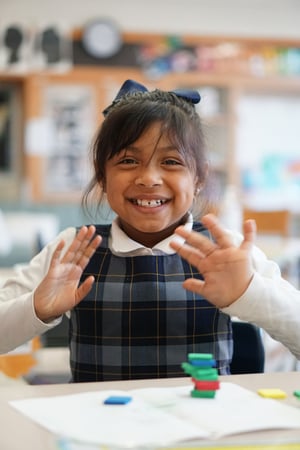 first-grade-girl-big-smile-tiles